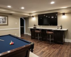 Finished basement with entertainment area and bar
